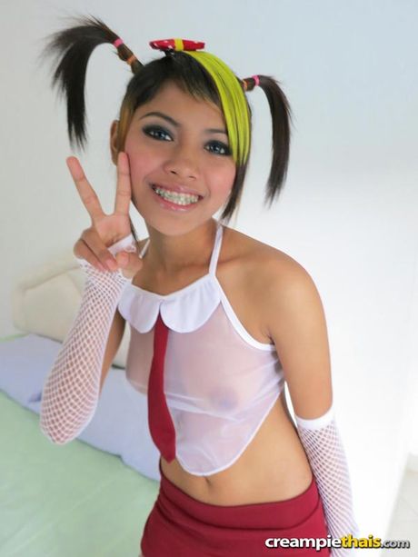 Japanese amateur woman with teen tits strips and shows her shaved pussy