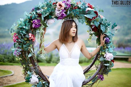 The Asian babe Apple strips and shows her hairy pussy in a solo outdoors