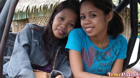 Amateur girls Tia and Weng share a dick in a public toilet