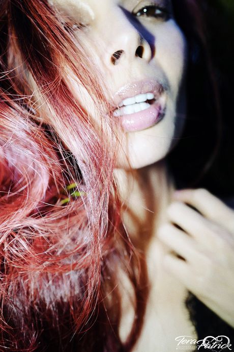 Hot Asian MILF Tera Patrick exhibits her big melons and ass in a solo