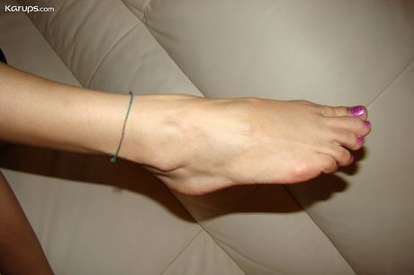 Asian teen Agnes strips and rubs wet pussy after a hot striptease