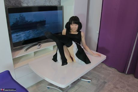 Asian maid Akuma Loli flaunts her perfect ass and tits in a solo