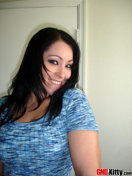 Asian teen Kitty unveils her big melons and toys her horny pussy