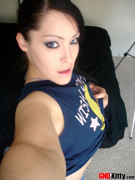 The brunette babe is so hot that she cant wait to get naked and play with her amazing juggs and pussy.