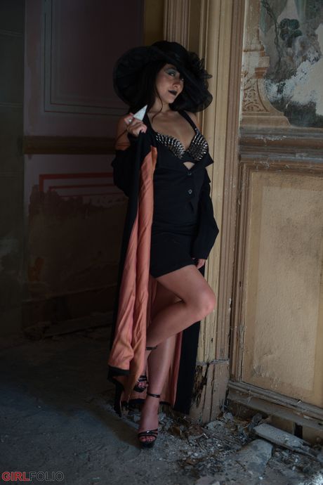 Asian teen Sophia Jade strips and shows her hairy pussy in a solo