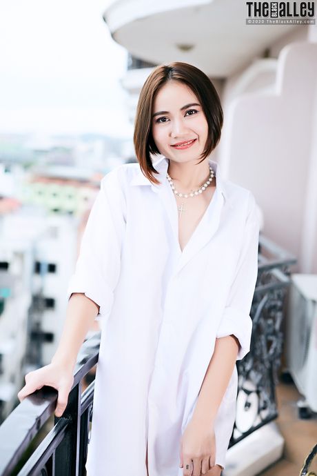 Asian teen Ellie strips and shows her tiny tits and pink pussy