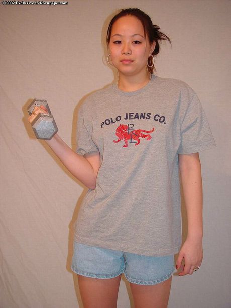 Excellent oriental youthful China in shorts exposes tiny tits and jerks off