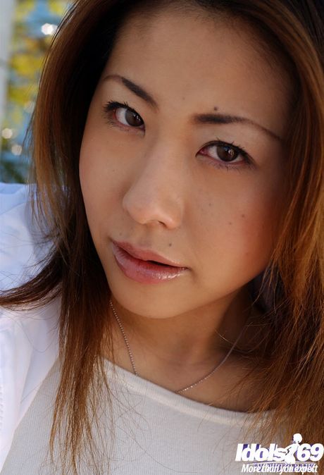 Peachy japanese babe Sumire reveals big titties and hairy pussy