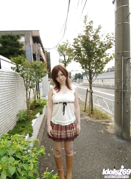 Foxy japanese teen Nami Ogawa exhibiting big titties and hairy pussy