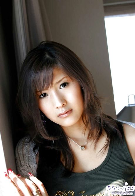 Slim japanese teen Sara Tsukigami uncovering small tits and hot butt