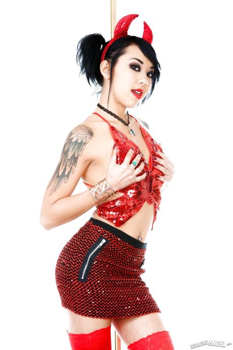 Sexy american brunette Kimberly Chi in cosplay costume in strange fetish gallery