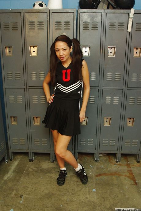 Attractive oriental milf Coco Velvet shows her ass