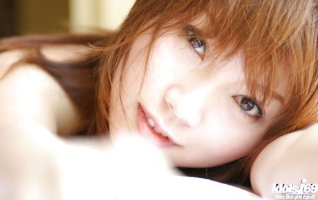 Sylphlike japanese teen Asami Ogawa baring her butt