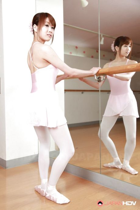 Very attractive japanese dark hair Ririka Suzuki in sexy skirt reveals big hooters and spreads her legs