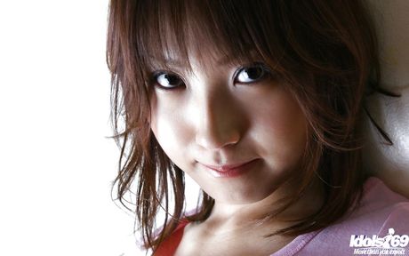 Slim japanese youthful Haruka Morimura exhibits her butt