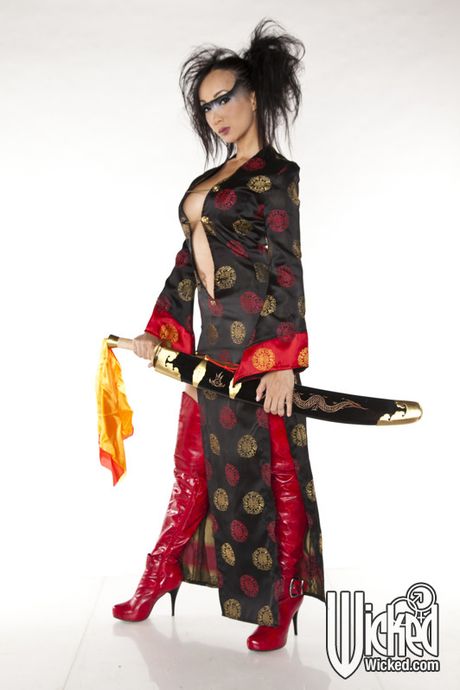 Inviting american milf Katsuni exposing big knockers and spreading her legs