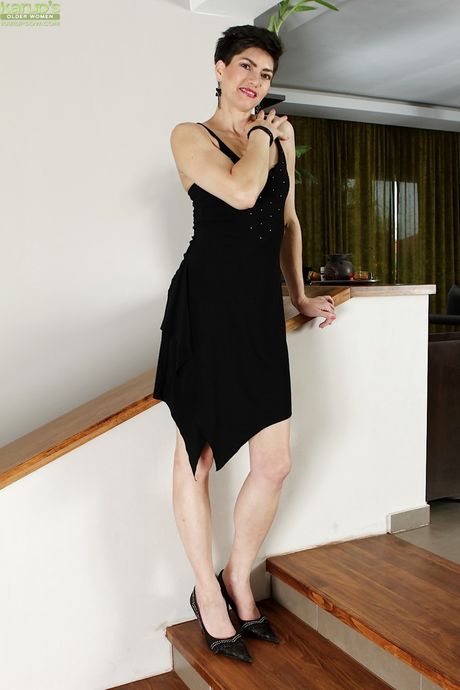 Rangy asian mature Halle B. exhibits small tits and spreads her legs