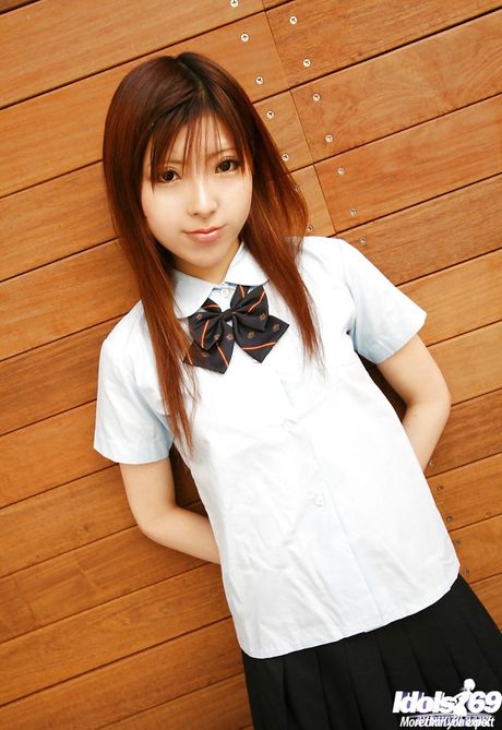 Rangy japanese teen Miyo in skirt exposing small tits and playing with toy